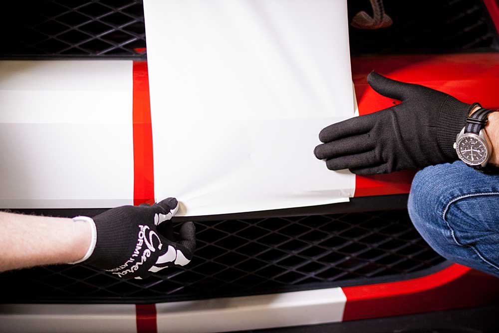 Placing vehicle wrap decals on a car